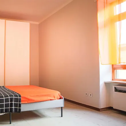 Rent this 6 bed room on Via Tigellio 24a in 09123 Cagliari Casteddu/Cagliari, Italy