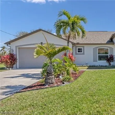 Buy this 3 bed house on Hunters Run Executive Golf Course in 1006 Southeast 4th Place, Cape Coral