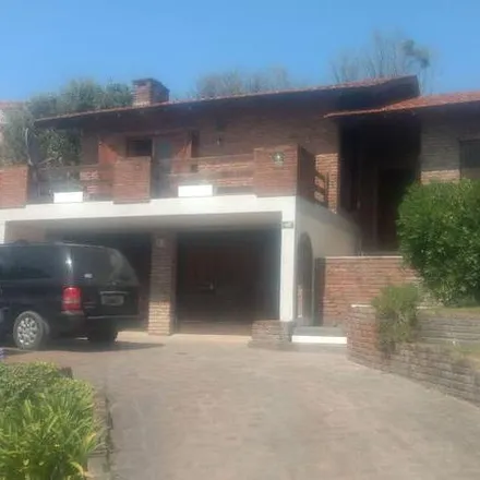 Buy this 3 bed house on Paseo 141 in Partido de Villa Gesell, 7165 Buenos Aires