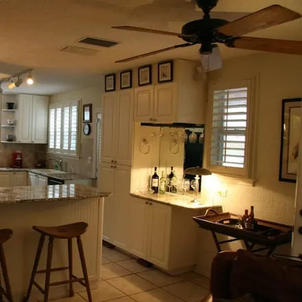 Rent this 3 bed house on Clearwater in FL, 33767