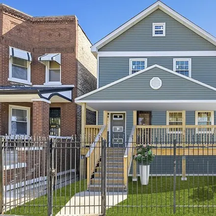 Buy this 6 bed house on 709 North Leamington Avenue in Chicago, IL 60651