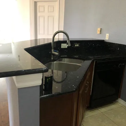 Rent this 3 bed apartment on 1572 Southeast New Hampshire Way in Stuart, FL 34994