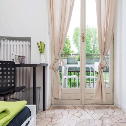 Rent this 4 bed room on Via Pasquale Fornari in 20146 Milan MI, Italy