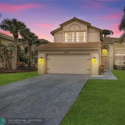 Buy this 4 bed house on 8613 Windy Circle in Aberdeen, Palm Beach County