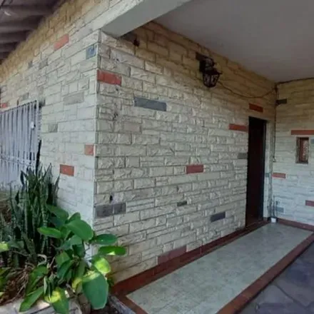 Buy this 4 bed house on Zuviría 43 in Partido de Lomas de Zamora, B1832 AHQ Temperley