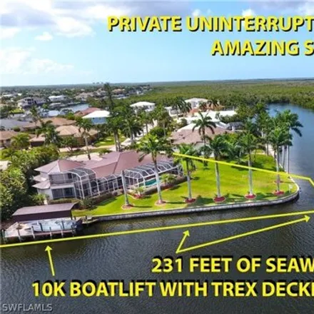Buy this 6 bed house on 5000 Southwest 29th Avenue in Cape Coral, FL 33914