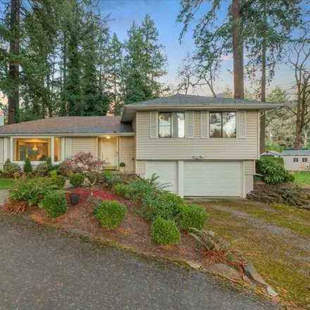 Buy this 3 bed house on 807 Southeast River Forest Court in Portland, OR 97267