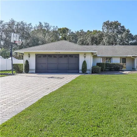 Buy this 3 bed house on 10250 Hoover Street in Spring Hill, FL 34608