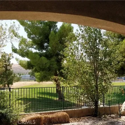 Rent this 4 bed apartment on 4398 Club Vista Drive in Palmdale, CA 93551