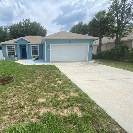 Rent this 3 bed house on 302 Buff Pass Drive in Eustis, FL 32726