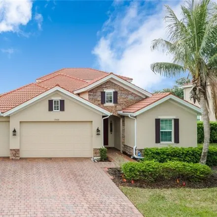 Buy this 3 bed house on 12600 Blue Banyon Court in Lochmoor Waterway Estates, Lee County