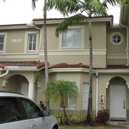 Rent this 2 bed townhouse on 10776 Northwest 83rd Terrace in Doral, FL 33178