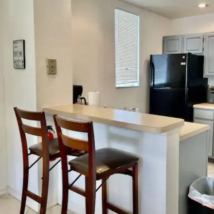 Rent this 4 bed townhouse on Kissimmee