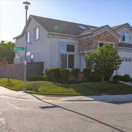 Buy this 4 bed house on 8759 Heritage Hill Drive in Elk Grove, CA 95624