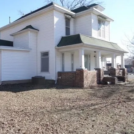 Image 3 - West Walnut Street, Butler, MO 64730, USA - House for sale