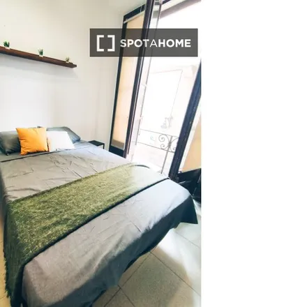 Rent this 7 bed room on Via Laietana in 08001 Barcelona, Spain