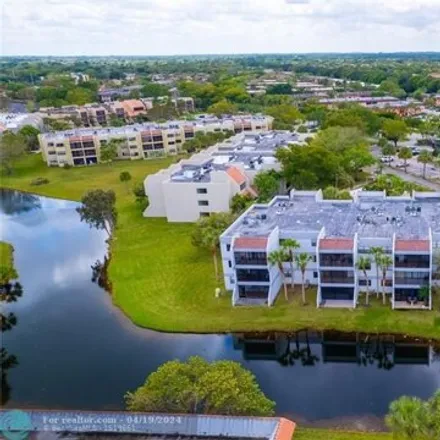 Rent this 2 bed condo on Lake View Drive in Weston, FL 33326