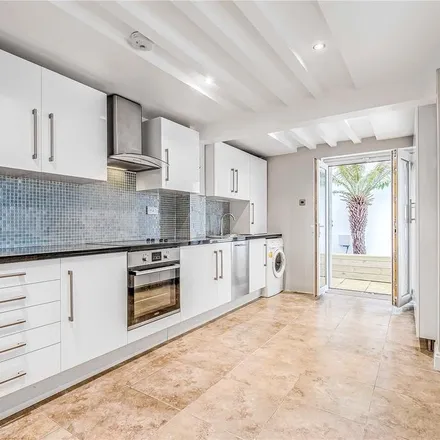 Rent this 4 bed townhouse on Pellant Road in London, SW6 7NF