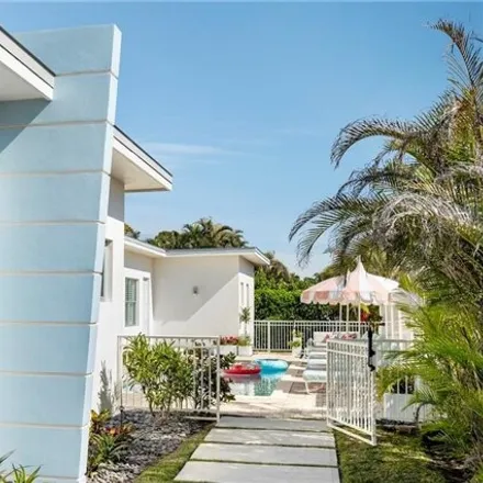 Rent this 4 bed house on 10052 Vanderbilt Drive in Pelican Bay, FL 34108