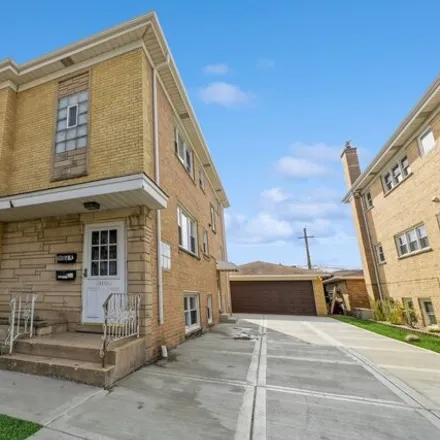 Buy this 7 bed house on 8517 West Foster Avenue in Chicago, IL 60656