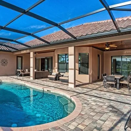 Rent this 3 bed house on 9646 Firenze Circle in Collier County, FL 34113