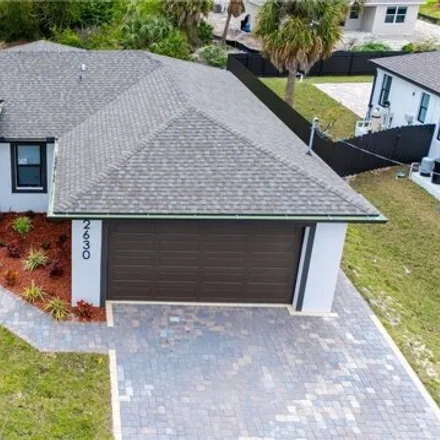 Buy this 3 bed house on 2667 Embers Parkway in Cape Coral, FL 33991