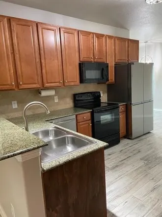 Rent this 2 bed townhouse on 901 Sterling Creek Circle in Harris County, TX 77450