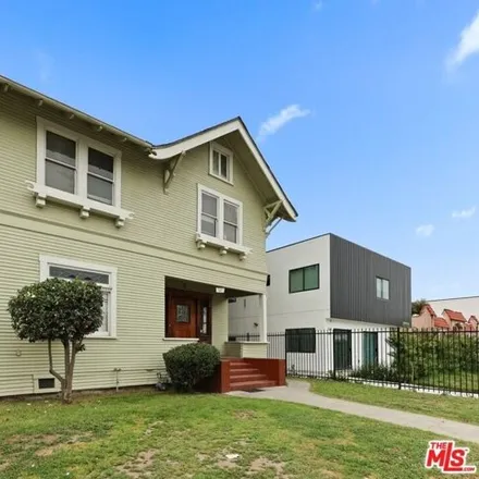 Buy this 4 bed house on 551 West 49th Street in Los Angeles, CA 90037