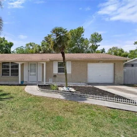 Buy this 3 bed house on 9358 Manati Street in Spring Hill, FL 34608