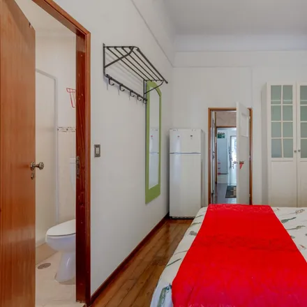 Rent this 4 bed room on Rua da Fé 51 in 1150-251 Lisbon, Portugal