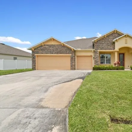 Buy this 5 bed house on 1842 Southwest Taurus Lane in Port Saint Lucie, FL 34984