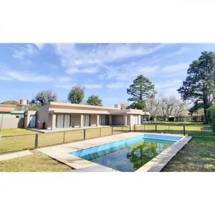 Buy this 4 bed house on Cimarrón 2273 in Profesional Country Club, Funes