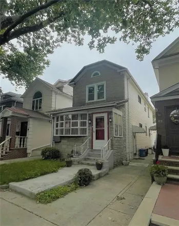 Rent this 2 bed townhouse on 64 76th Street in New York, NY 11209