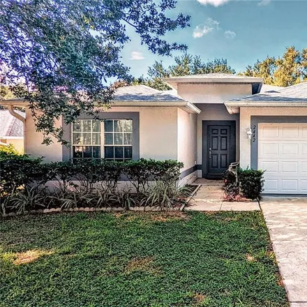 Buy this 4 bed house on 2250 Tealwood Circle in Tavares, FL 32778