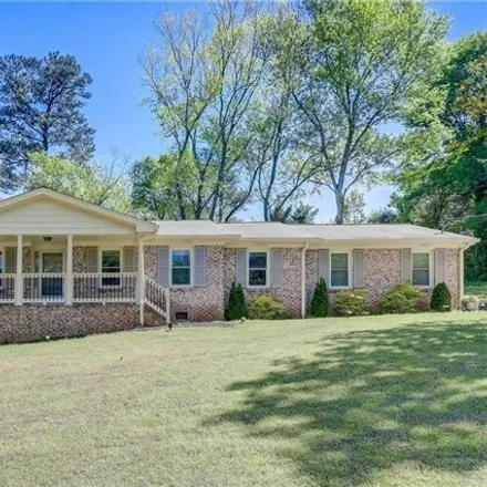 Buy this 3 bed house on 1684 Pine Circle Northwest in Murphyville, GA 30044
