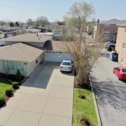 Buy this 3 bed house on 7989 West 79th Place in Bridgeview, IL 60455