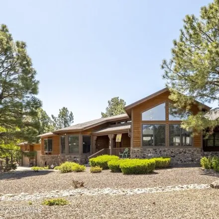 Buy this 5 bed house on 5310 North Nordica Loop in Flagstaff, AZ 86004