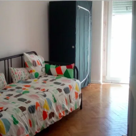 Rent this 3 bed room on Rua Francisco de Holanda in 1600-093 Lisbon, Portugal