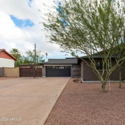Rent this 4 bed house on 246 East Riviera Drive in Tempe, AZ 85282