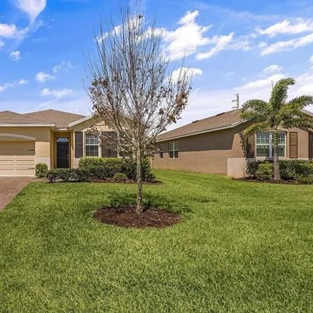 Buy this 4 bed house on 2561 Crowned Eagle Circle Southwest in Florida Ridge, FL 32962