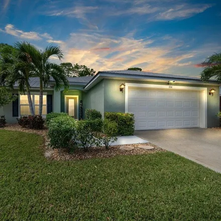Buy this 4 bed house on 104 Chicory Avenue Northeast in Palm Bay, FL 32907