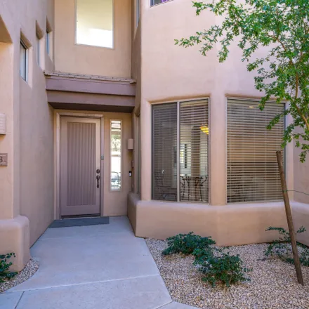 Rent this 3 bed townhouse on North Thompson Peak Parkway in Scottsdale, AZ 85060