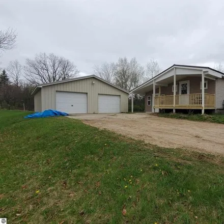Buy this 2 bed house on 5867 Cadillac Drive in Surrey Township, MI 48632