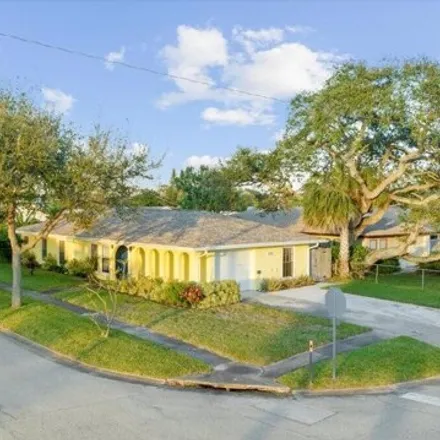 Rent this 3 bed house on Cape Canaveral Rescue Station 60 in Poinsetta Avenue, Cape Canaveral