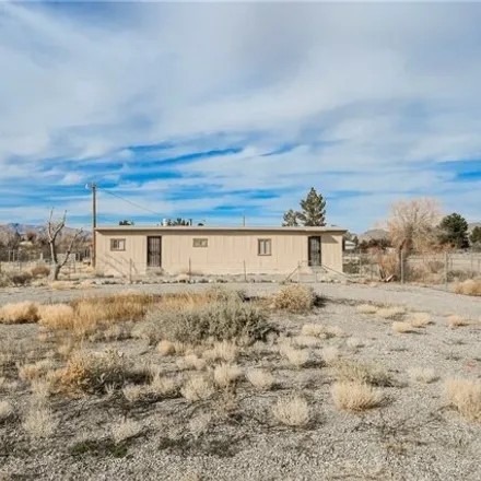 Buy this studio apartment on 214 South Woodchips Road in Pahrump, NV 89048