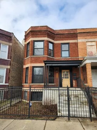 Rent this 4 bed apartment on 6804 South Champlain Avenue in Chicago, IL 60637