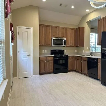 Image 7 - 9646 Catalina Leaf Lane, Gleannloch Farms, TX 77379, USA - Townhouse for sale