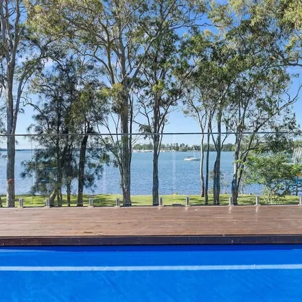 Rent this 4 bed house on Lake Macquarie City Council in New South Wales, Australia