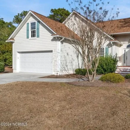 Rent this 3 bed house on 4167 Churchill Circle Southeast in St. James, NC 28461