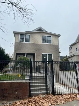 Buy this 7 bed house on Auto Lease LLC NJ in 624 East 25th Street, Paterson